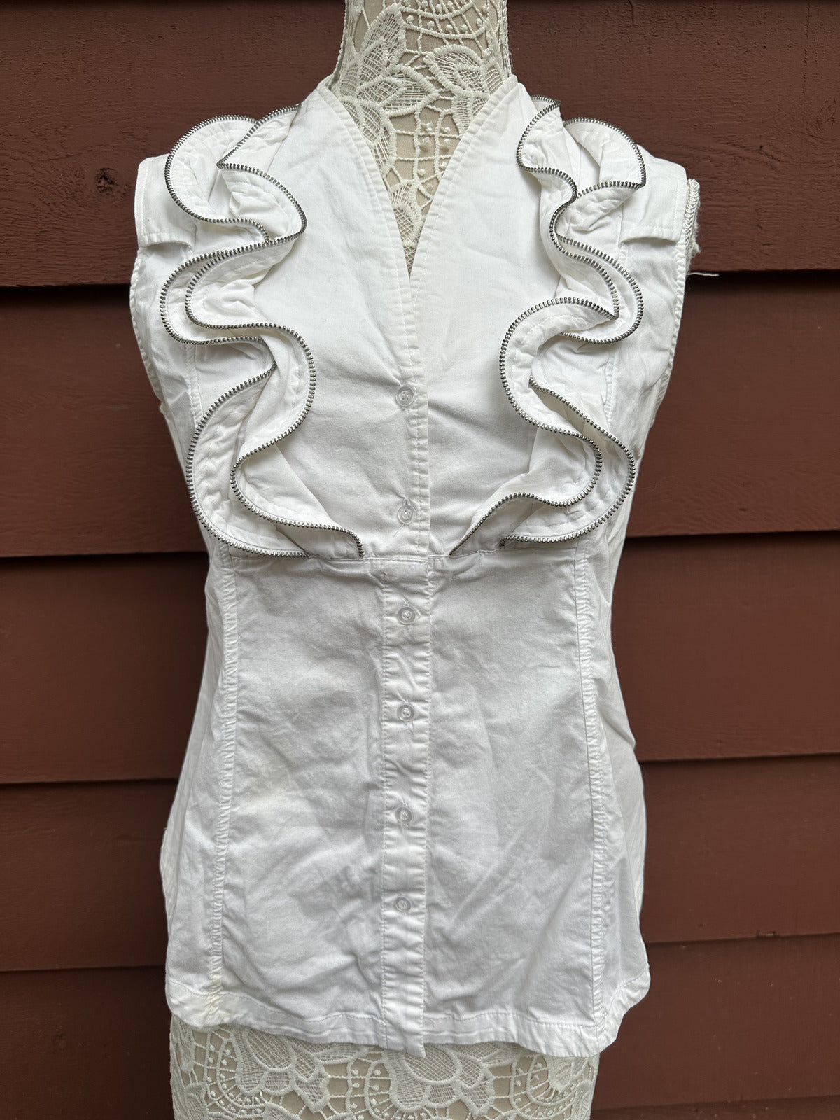 Dusak Designs White Sleeveless Blouse with Silver Zipper Ruffle Trim