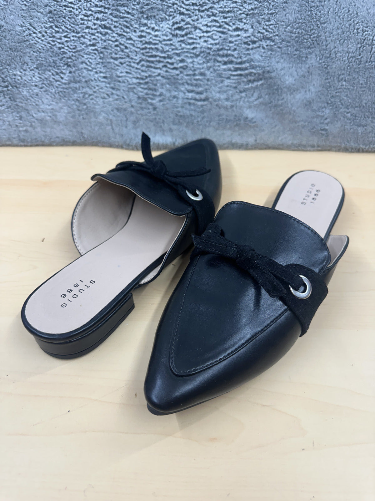 Studio 1886 Black Leather and Suede Slip On Mules with Bow Accent