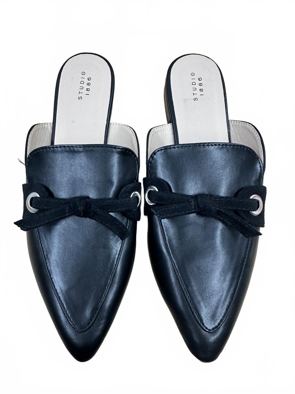 Studio 1886 Black Leather and Suede Slip On Mules with Bow Accent