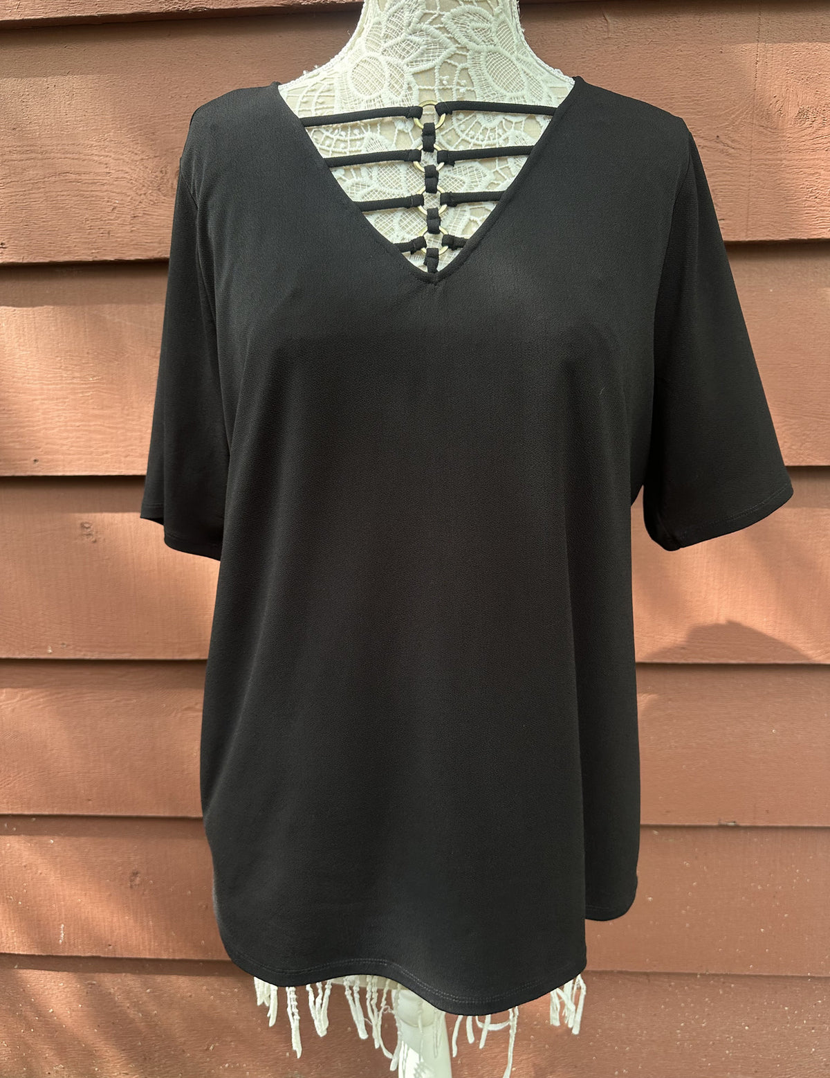 Bold Elements Black Cut to Curve V Neck Top with Strap and Ring Detail