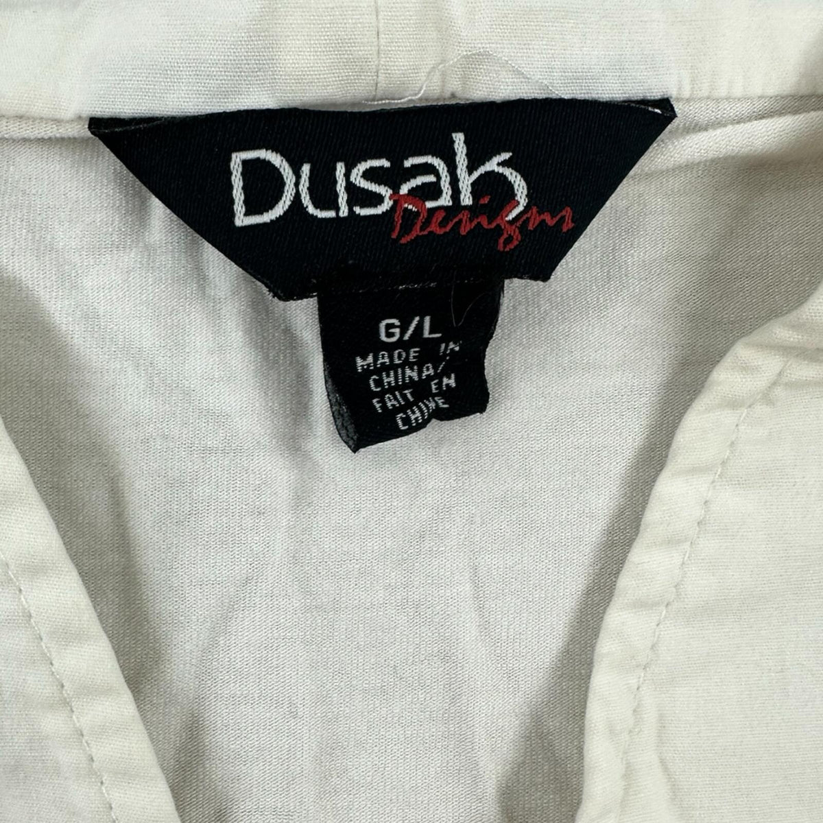 Dusak Designs White Sleeveless Blouse with Silver Zipper Ruffle Trim