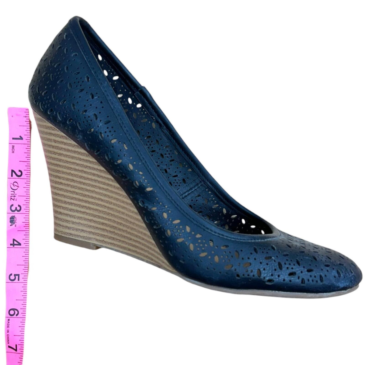 Fergalicious Black Laser Cut Floral Wedges with Faux Wood Grain Heel